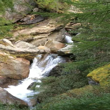 In Grund Amid Mountains Alpehytte *